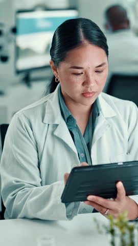 Medical research, scientist and woman with tablet, lab and online for cure of illness or healthcare. Clinic, oncologist and person with tech for analysis, diagnosis and digital records for cancer