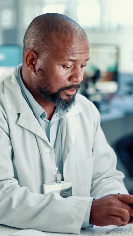 Man, scientist and writing with research for medical study or new discovery at laboratory. Male person, biologist or taking notes with documents for science results or development at health clinic