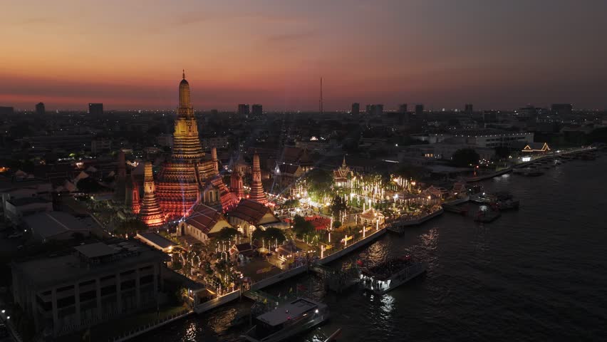 Wat arun temple glowing with vibrant festival illumination, Aerial View, Bangkok, Thailand
