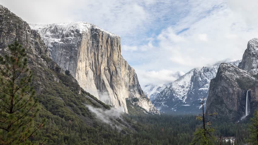Time lapse of a snowy winter landscape looking down Yosemite Valley in Yosemite National Park