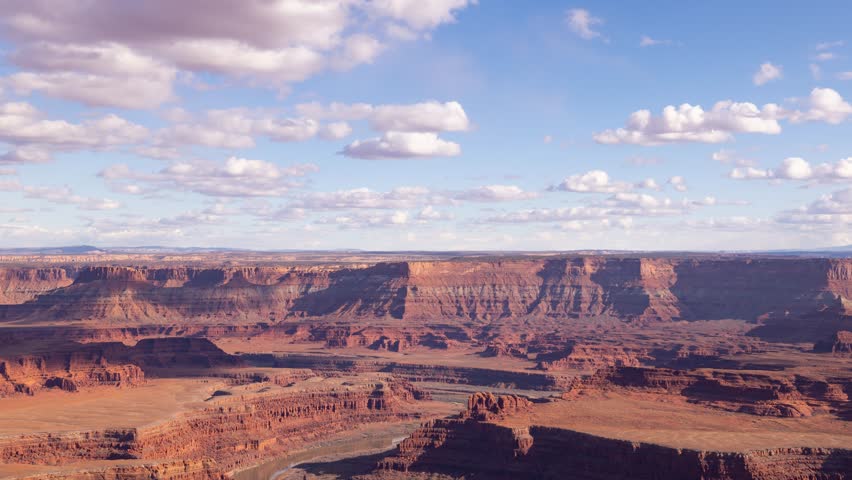 Time Lapse of the clouds moving above the rugged landscape near Canyonlands National Park in Moab Utah.