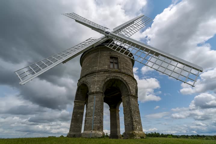 Chesterton Windmill timelapse with fast-moving clouds over a green field in Warwickshire, England