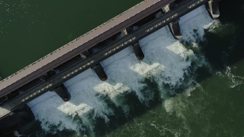 Super slow motion footage of a dam releasing a huge amount of water