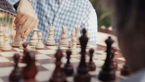 Little boys friends playing board game - chess. Children learning to move pieces - Powered by Shutterstock - Get 15% off with code: PIKWIZARD15