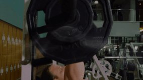 Fitness enthusiast lifting barbell off rack, lowering and pressing incline bench for chest strength. Strength training, gym environment, muscular physique, weight lifting, workout session, fitness - Powered by Shutterstock - Get 15% off with code: PIKWIZARD15