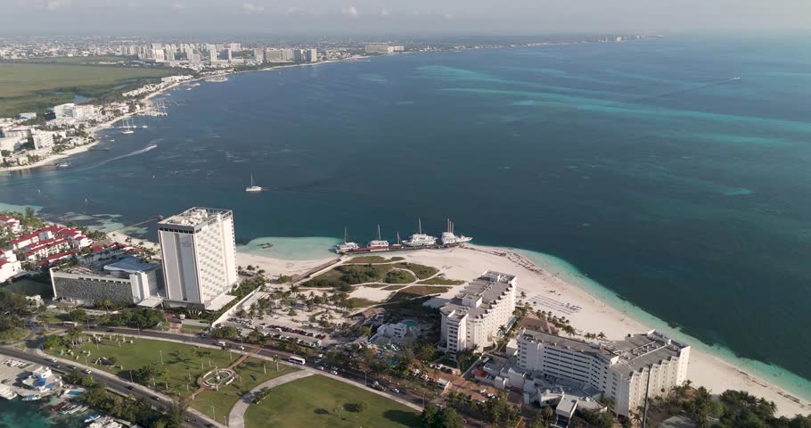 Sunny day in Cancun, aerial view of the hotel zone and its beautiful beaches.