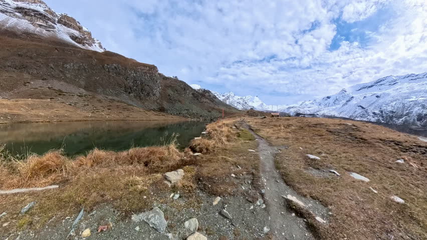 Hiking on Dirt Trail Next to Lake Sellisee