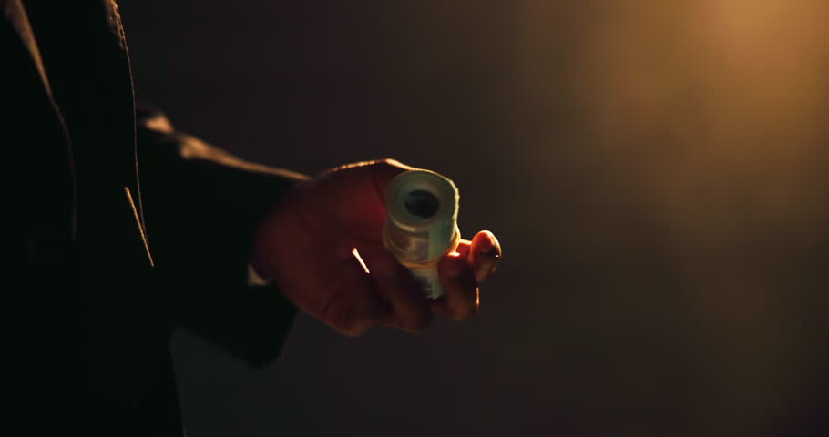 Hands, night or throwing cash for illegal business, money laundering or investment scam in crime syndicate. Roll, financial or fraudulent criminal with bank notes for stealing, corruption or capital