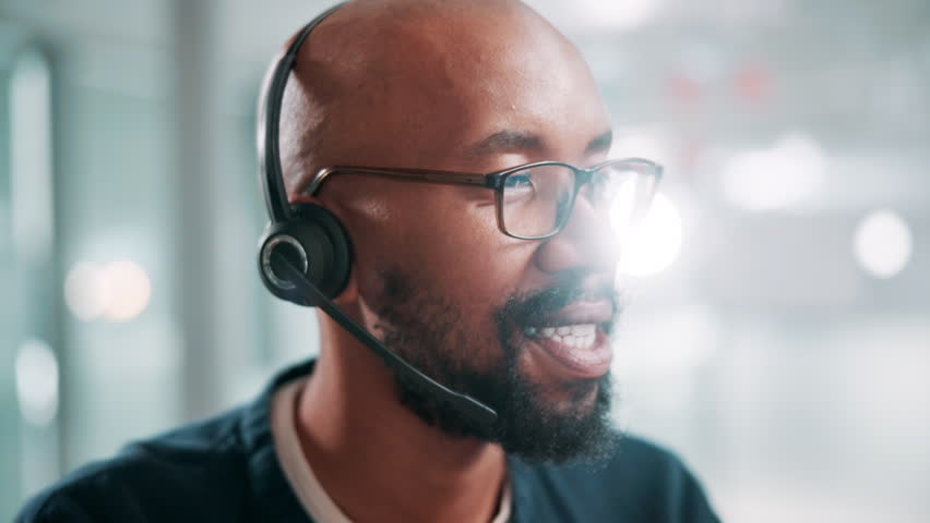 Call center, talk and face of black man at help desk for customer service or multilingual support agent. Consultant, speaking and assistance with headset for crm, language translation or contact us