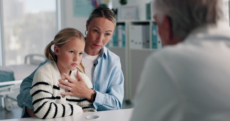 Mom, kid and consultation with pediatrician in doctors office for chest pain diagnosis. Parent, child and talk to mature medical worker for help with symptoms, breathing problem or healthcare checkup