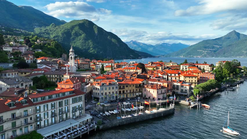 Lago Como drone view, Menaggio village on lake Como in Lombardy, Italy, luxurious holiday destination in Italy, Italian alpine lakes, resort on Como lake. High quality 4k footage
