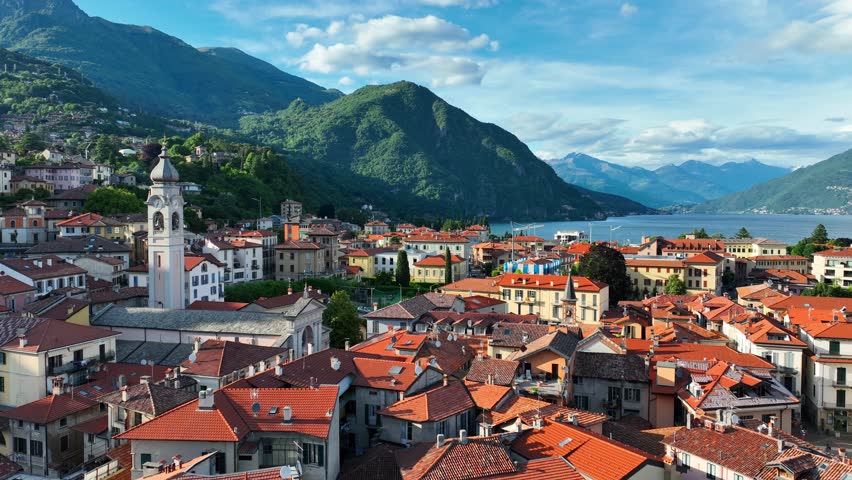 Drone establishing shot of Menaggio village on lake Como in Lombardy, Italy, luxurious holiday destination in Italy, Italian alpine lakes, resort on Como lake. High quality 4k footage