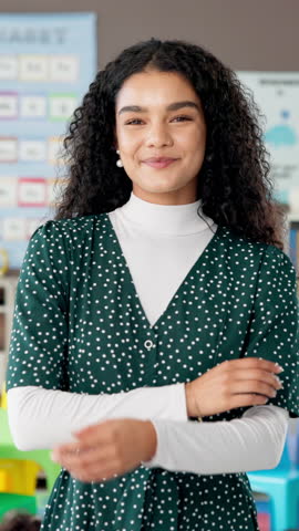 Arms crossed, face and smile of woman teacher in classroom of school for child development or scholarship. Education, knowledge and study with happy educator at academy for future, growth or teaching