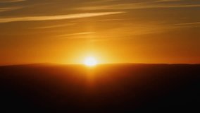 Radiant Desert Sunrise with Clouds and Fog Timelapse Zoom Out - Powered by Shutterstock - Get 15% off with code: PIKWIZARD15