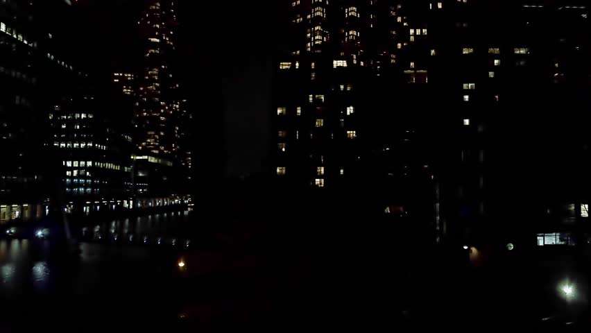 London subway passing through Canary wharf during night-time
