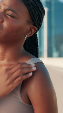 Fitness, black woman and shoulder pain with injury outdoor for running accident, muscle tension and cardio workout. Runner, athlete and joint strain in city road for exercise mistake and inflammation