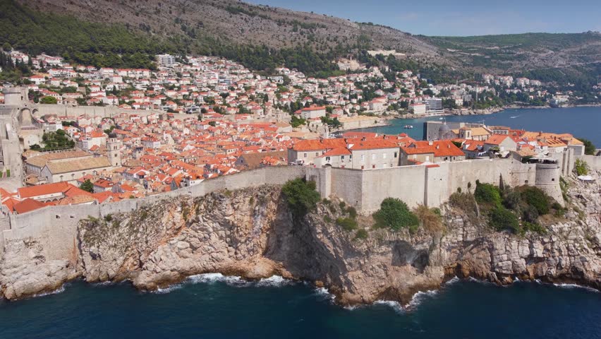 Distant view of Dubrovnik city, coastal city on Adriatic sea. Magnificent cityscape of old town, summer tourist attraction of Croatia