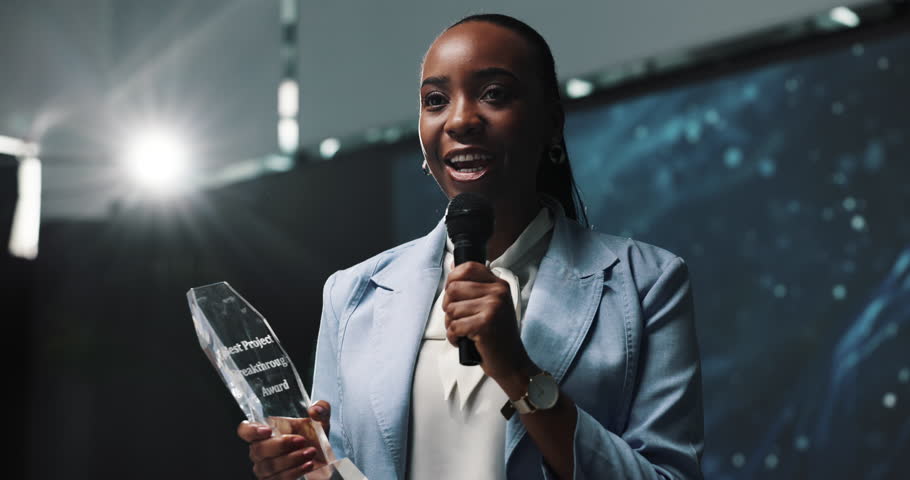 Award, speech and stage with business black woman in conference room for ceremony or prize giving. Presentation, speaker and winner with employee on podium for acceptance, announcement or thank you