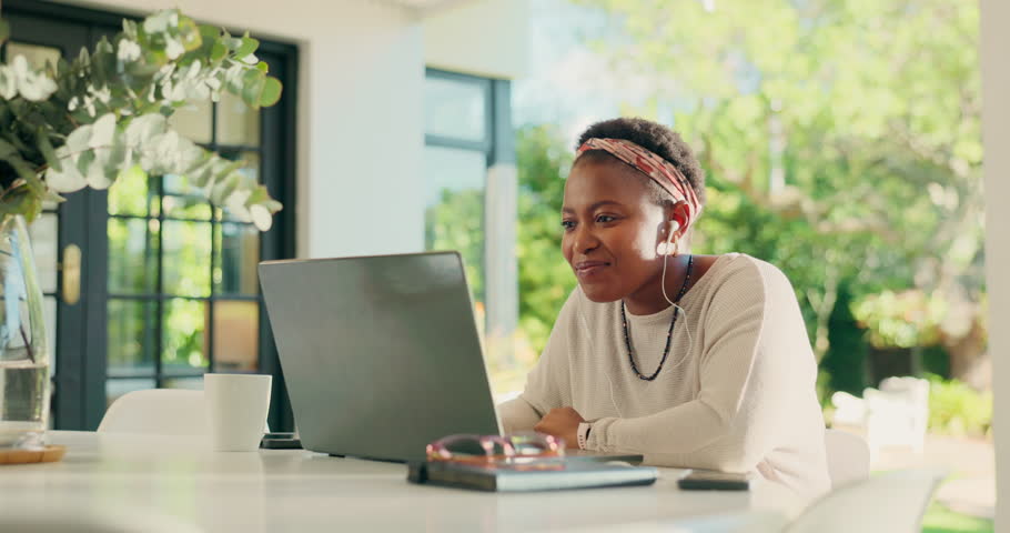 Home, creative and woman with laptop, earphones or song for inspiration, author or typing for novel. Happy, freelancer and black person with tech for story, listen and online for music or remote work