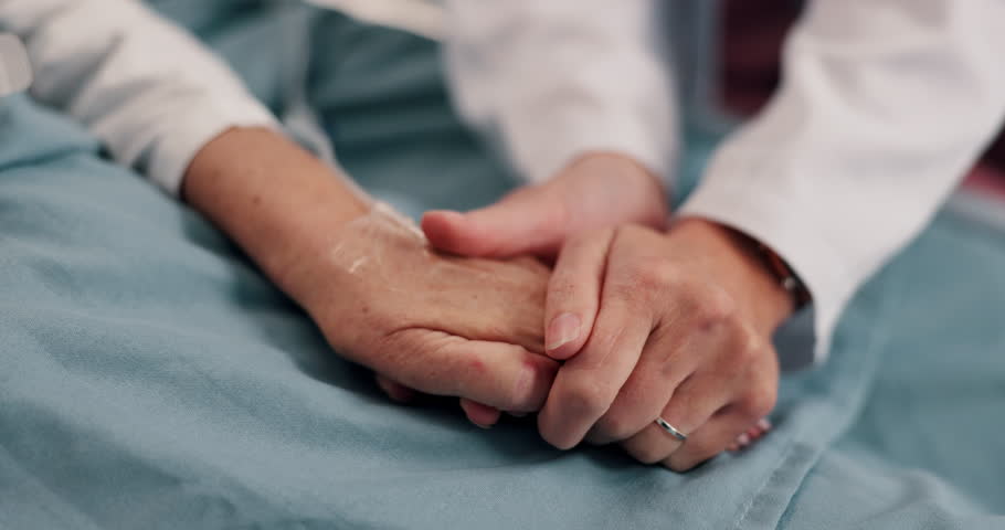 Holding hands, support and patient with family in hospital with empathy, love and compassion. Trust, bonding and person with daughter for visit with connection, hope or comfort in medical clinic.