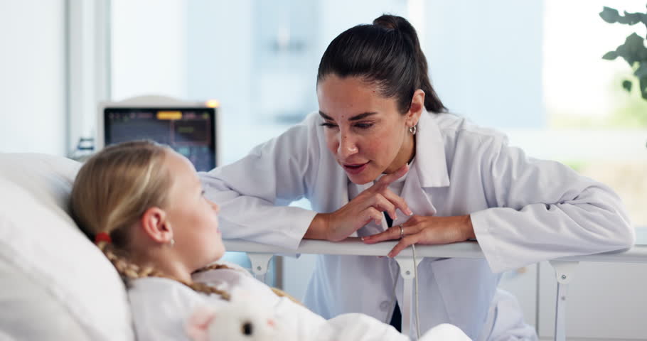 Hospital, consulting and doctor with child in bed for medical service, talking and treatment. Healthcare, pediatrics and woman with girl to explain surgery, procedure results and patient diagnosis