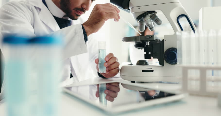 Scientist, man and microscope with chemistry for project, breakthrough or medical research. Biotech, laboratory and tablet with DNA solution for pharmaceutical RNA or chemical experiment study