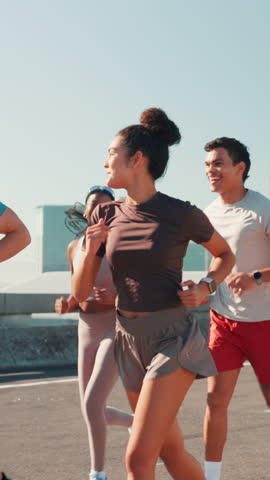 City, group and friends for fitness, wellness challenge and training for marathon on bridge. Women, man and running people with endurance for exercise, cardio and morning jog on road with workout