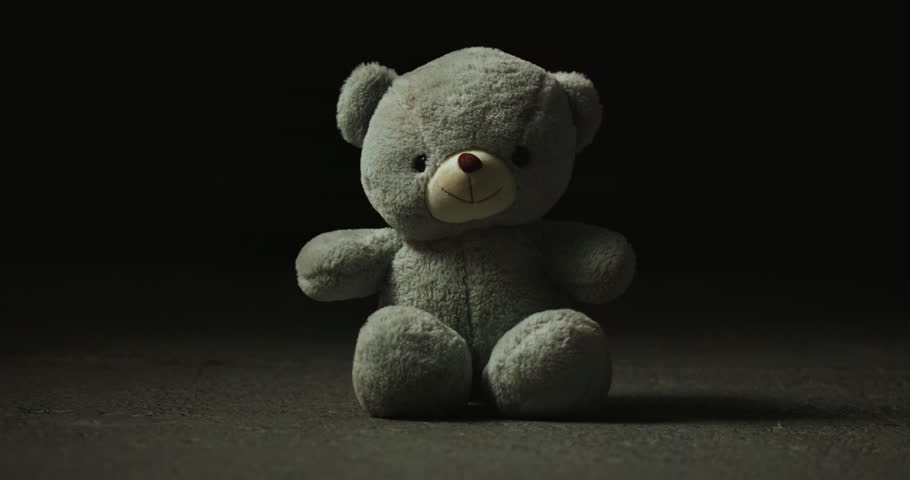 Abandoned, lost and adoption fail with teddy bear in studio for loneliness, depression and grief. Foster care rejection, stuffed animal and mental health with toy on dark background for fear