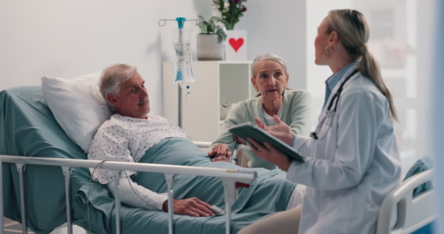 Senior couple, patient and doctor with tablet on hospital bed for diagnosis or medical results. Elderly man, woman and healthcare worker consulting with technology for health treatment or recovery