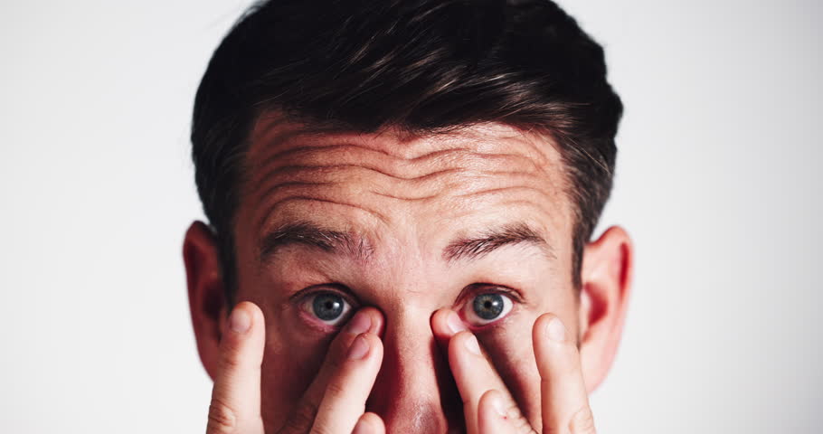 Eyes, face and skincare closeup of man in studio for antiaging, dermatology or moisturizing. Cosmetics results, beauty or hydration with smile of person on white background for aesthetic or wellness