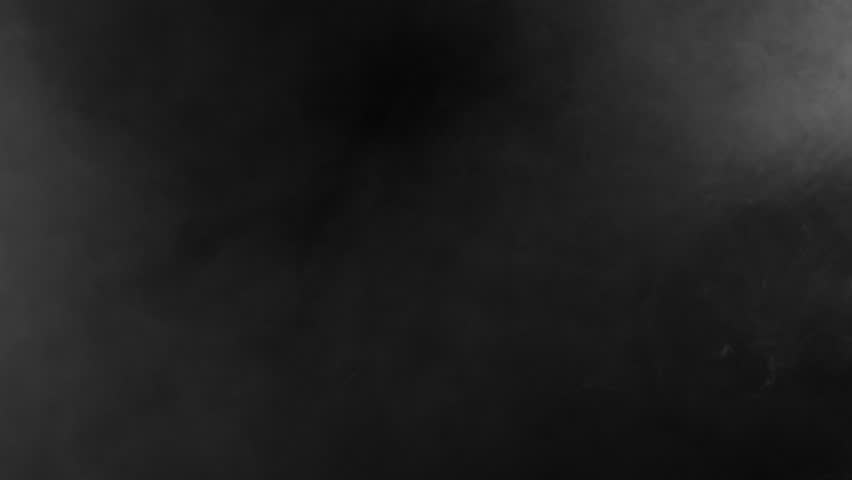 Very subtle dark grey fog or smoke drifts gently across black background. Eerie and mysterious atmospheric overlay for suspenseful scenes