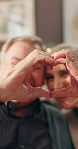 Old couple, heart and hands for love in home, happiness and support in marriage with symbol for affection. Trust, loyalty and connection with gesture for care, wellness and senior people for romance