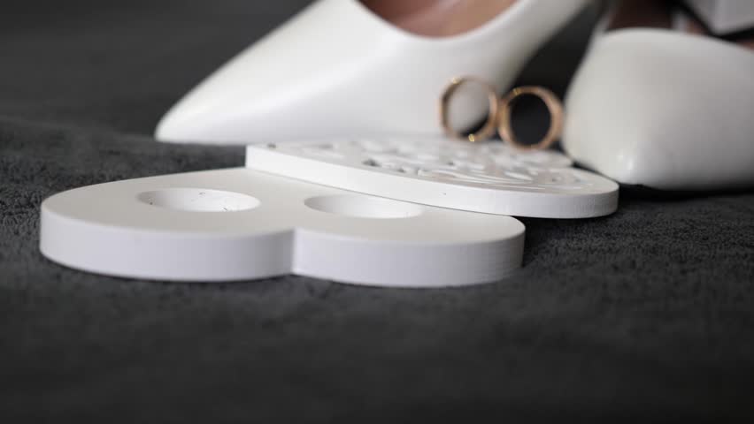 Wedding gold rings and bride