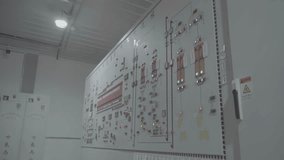 Machine control panel high-tech factory automation with electrical diagrams and touchscreen controls with green and red indicator lights - Powered by Shutterstock - Get 15% off with code: PIKWIZARD15