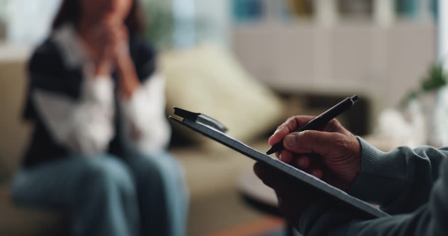 Clipboard, counseling or writing with patient and therapist in office for assessment or review. Hands, mental health or psychology with medicine professional and person in session for therapy