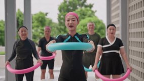 Group Asian Geriatric exercise before Aquatic therapy in swimming pools or hydrotherapy pools by coach Physiotherapist.Elderly hydrotherapy,physiological wellness,Balance training,health care concept - Powered by Shutterstock - Get 15% off with code: PIKWIZARD15