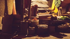 A bustling market display showcases various spices, textiles, and traditional artifacts in an old national African bazaar. Vendors invite customers to explore the rich culture and flavors. - Powered by Shutterstock - Get 15% off with code: PIKWIZARD15
