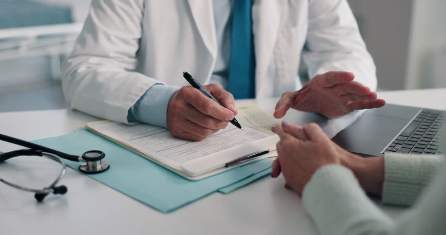 Doctor, hands and patient with document for medical aid, life insurance or application in clinic. People, explain healthcare and clipboard for form, survey or contract for service registration