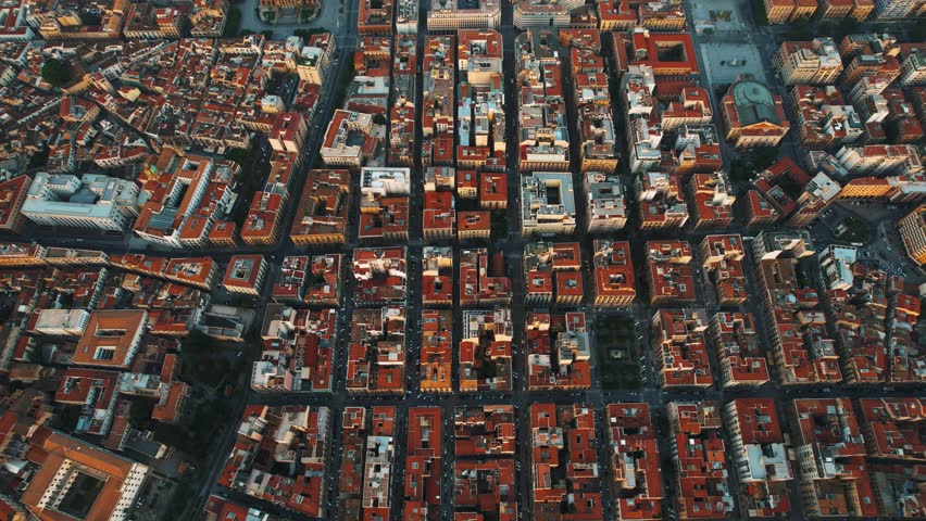 Palermo old city, showing a maze of narrow streets, domes, and tiled roofs. Sicily, Italy aerial drone