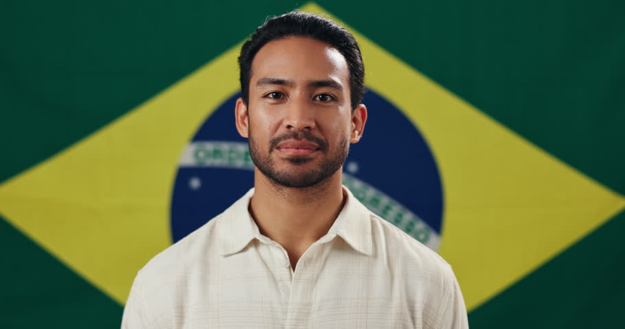 Face, man and laughing with flag for Brazil, voting and pride with confidence for citizenship. Portrait, male person and patriotic with freedom for nationality, country or positive attitude by symbol