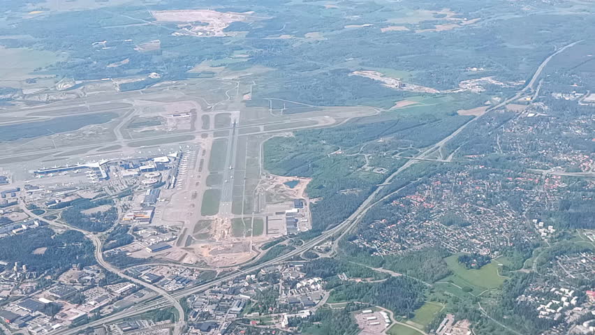 Helsinki-Vantaa airport from an airplane. Ruskesanta and Harjusuo areas also visible. It