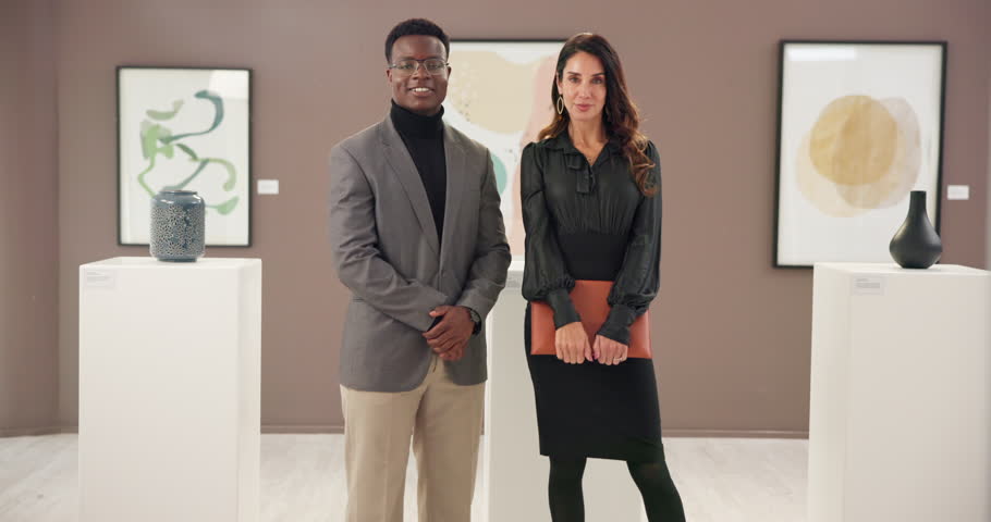 Face, man and woman in art gallery, exhibition and collaboration for project, colleagues and smile. Museum, curator and teamwork for fundraising event, creative and happy people with file in Canada