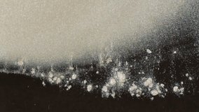 Fine white pearlescent powder flows in slow ripples across the screen, creating an elegant and soft gradient. - Powered by Shutterstock - Get 15% off with code: PIKWIZARD15