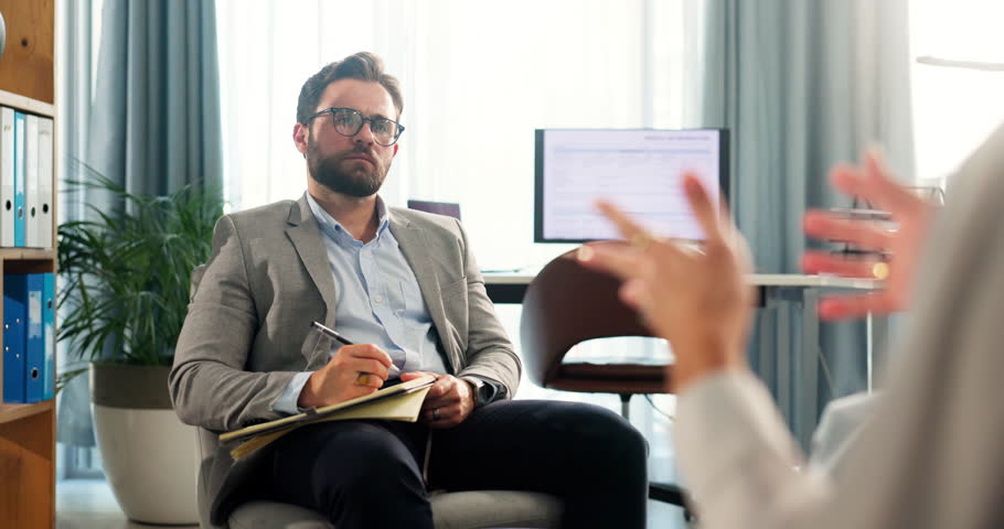 Therapist, notes and patient in consultation for mental health, discussion and recovery support for anxiety. Therapy, psychologist and hands of person for counseling, share trauma and client session