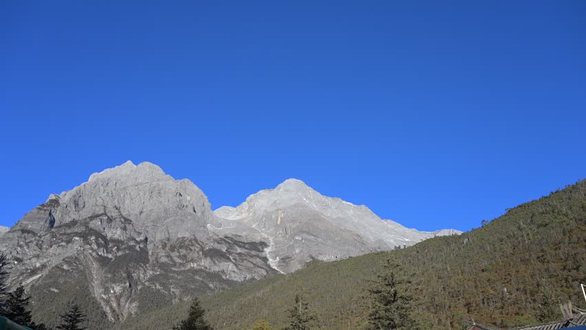 Jade Dragon Snow Mountain,Yunnan,Kunming,China,snowy peaks,majestic views,high altitude,serene landscape,travel destination,pristine snow,cultural heritage,adventure tourism,stunning panorama