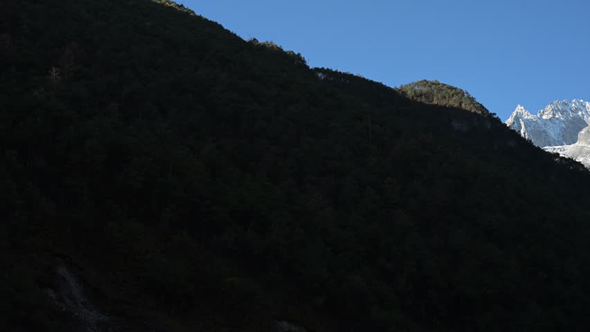 Jade Dragon Snow Mountain,Yunnan,Kunming,China,snowy peaks,majestic views,high altitude,serene landscape,travel destination,pristine snow,cultural heritage,adventure tourism,stunning panorama