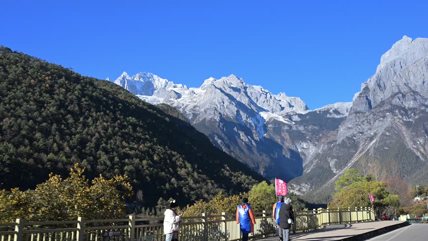 Jade Dragon Snow Mountain,Yunnan,Kunming,China,snowy peaks,majestic views,high altitude,serene landscape,travel destination,pristine snow,cultural heritage,adventure tourism,stunning panorama