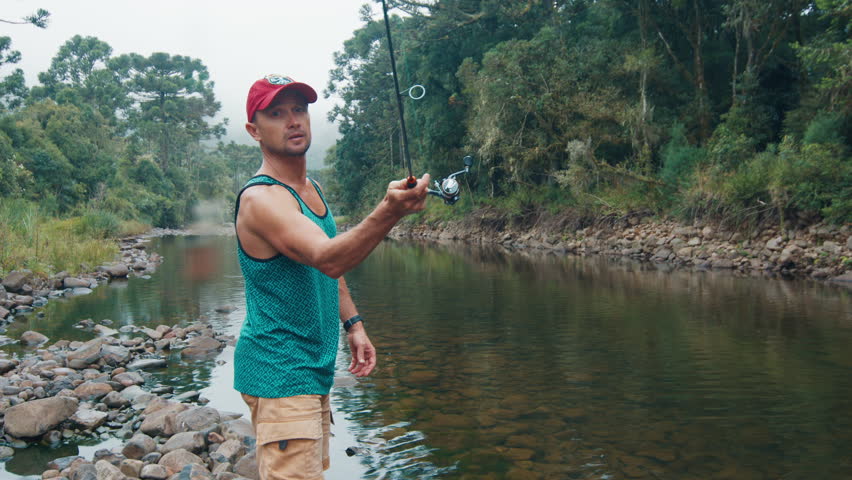 Amateur angler casts the lure and fishing in the river