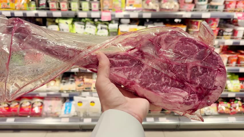 choosing pork, beef and other meats at the grocery store