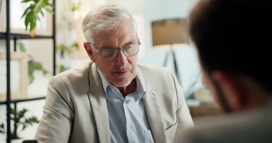 Mature manager, businessman and discussion with client for wealth management, financial advice or listen. Meeting, consultation and ideas for investment planning, profit report and strategy in office